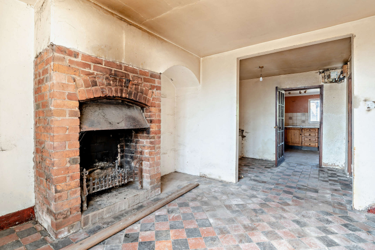 Sitting room through to kitchen